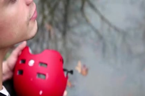 Inked & very cute Dean Monroe wearing latex rimming outdoors